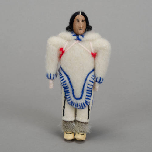 Female in traditional clothing doll