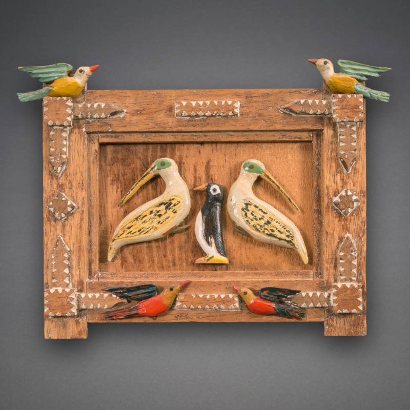 Tramp art plaque with birds and penguin