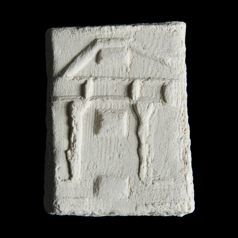 Sacred clay tablet with linear design depicting architectural forms 