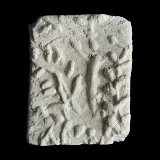 Sacred clay tablet with small crucifix at right center