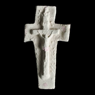 Sacred clay tablet in the shape of a cross