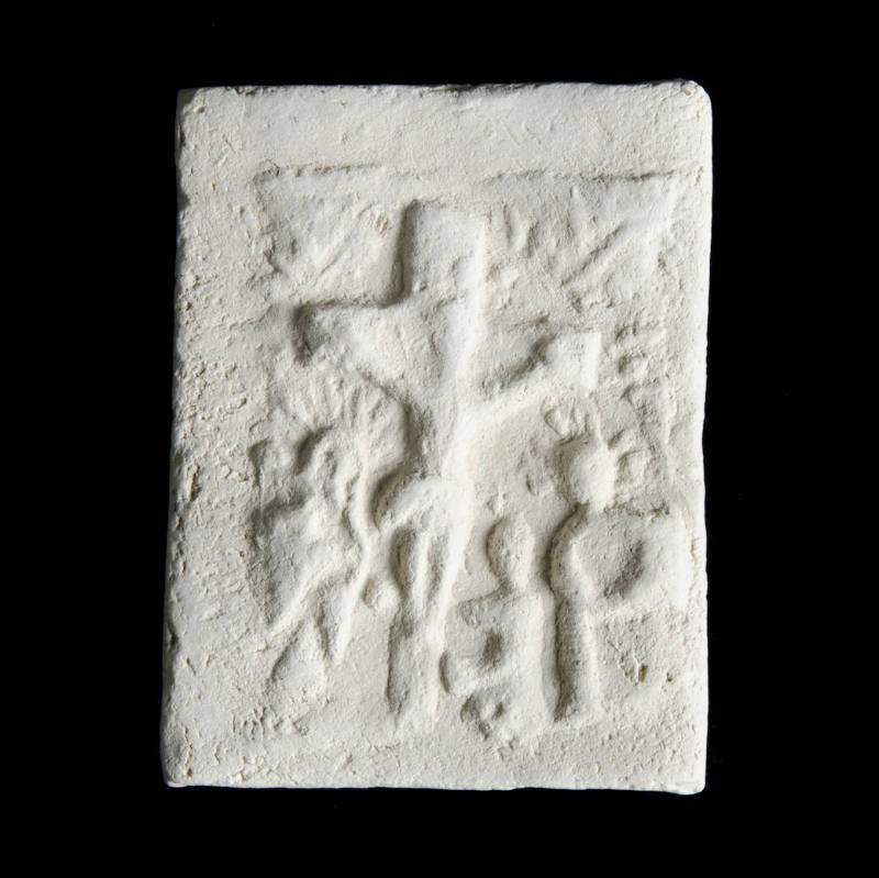 Sacred clay tablet with crucifixion scene with three figures at base