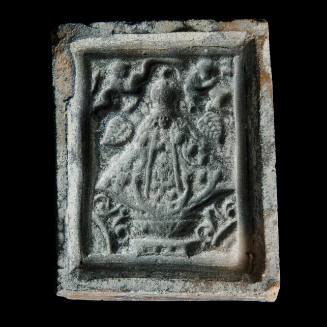 Sacred clay tablet mold of Virgin with single leaf on each side