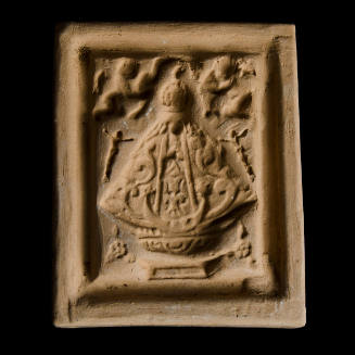 Sacred clay tablet mold of Virgin with pair of crucifixes