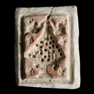 Sacred clay tablet mold of Virgin with many small dots indented in gown