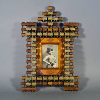 Tramp art puzzlework frame