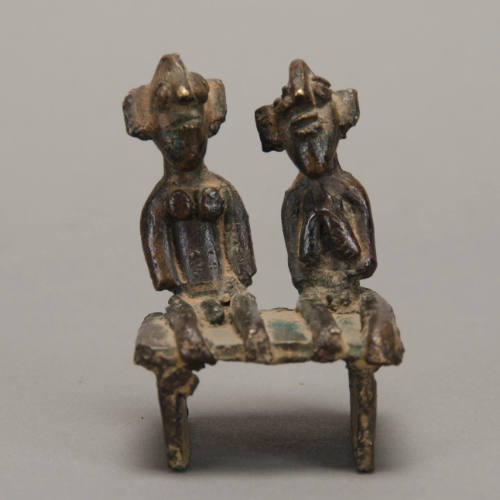 Seated couple sculpture