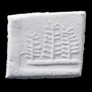 Impressed clay tablet votive offering with three trees