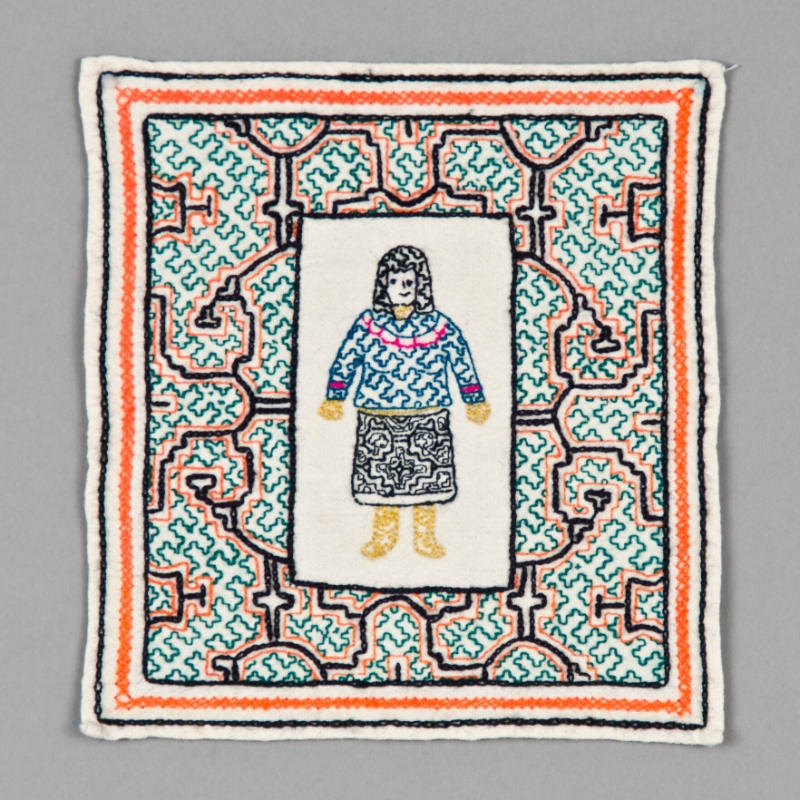 Embroidered textile with woman in traditional dress