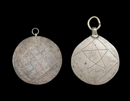 Double-sided pendant with magic squares containing Arabic writing
