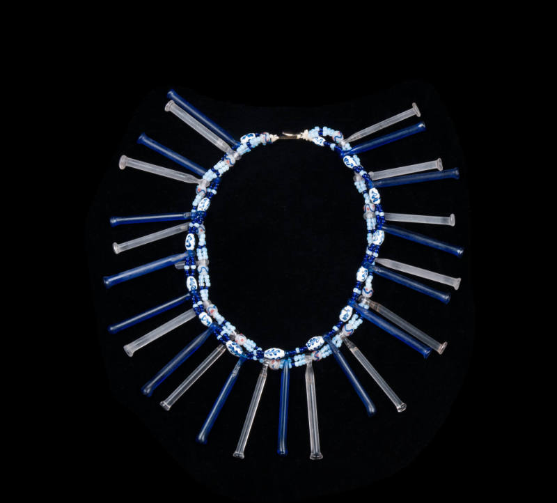 Necklace, glass rods interspersed with oval beads