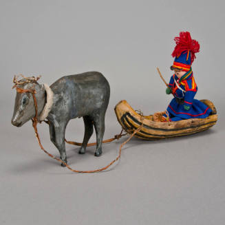 Male Doll in Reindeer-Drawn Sled