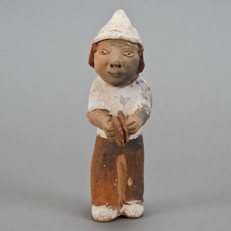 Figural whistle, man playing cymbals