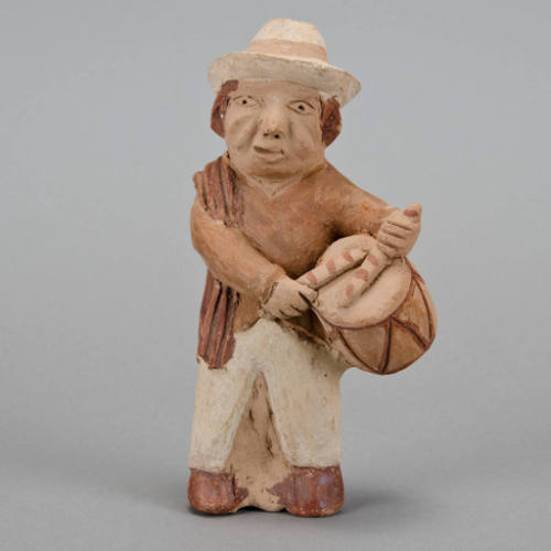 Figural whistle, man playing drum