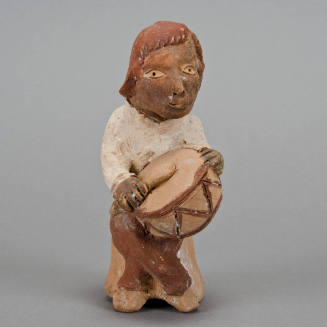 Figural whistle, man playing drum