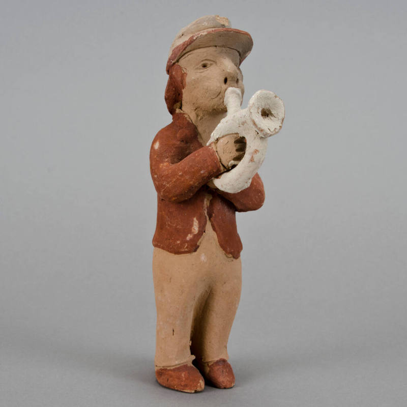 Figural whistle, man playing horn