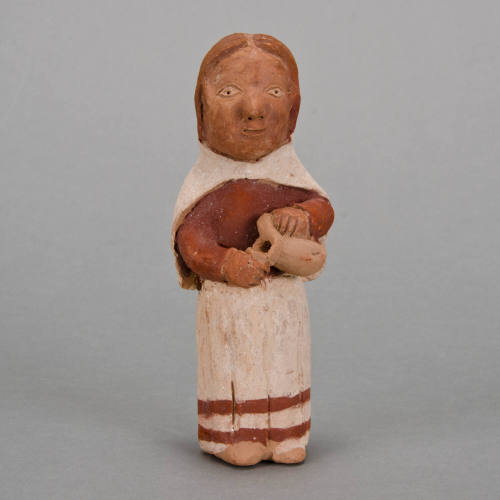 Figural whistle, woman with pitcher