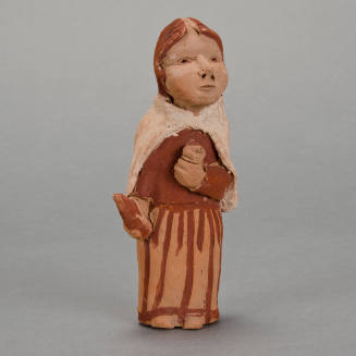 Figural whistle, woman with bottle and cup