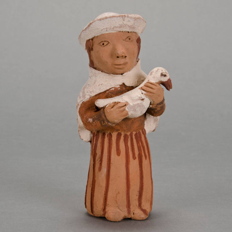 Figural whistle, woman holding duck