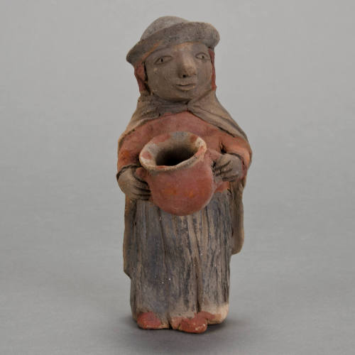 Figural whistle, woman with jar