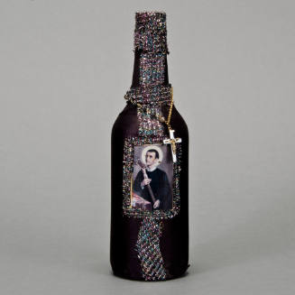 Gede libation bottle