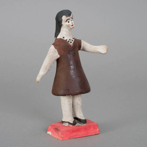 Figure, woman with arms extended