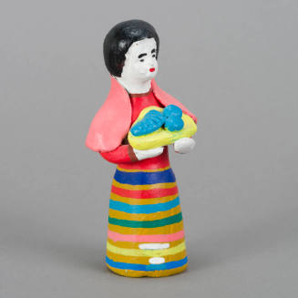 Figure, woman holding yellow basket