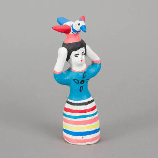 Figure, woman with bird on head