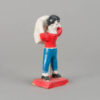 Figure, man carying sack on back