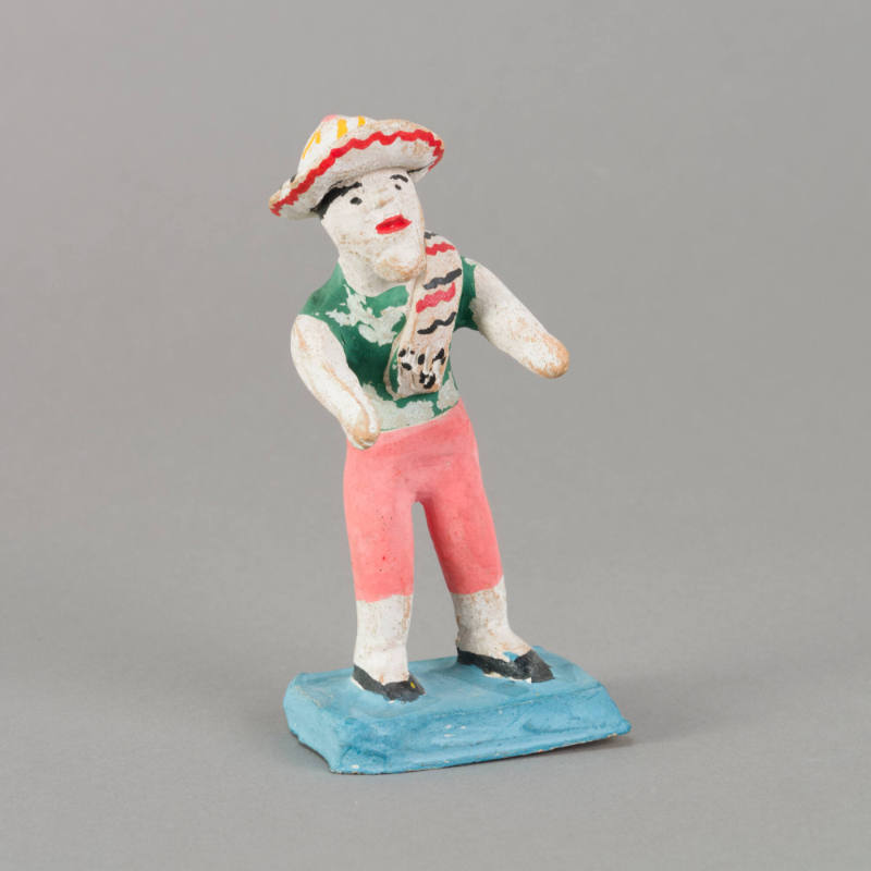 Figure, man with sombrero and serape on shoulder