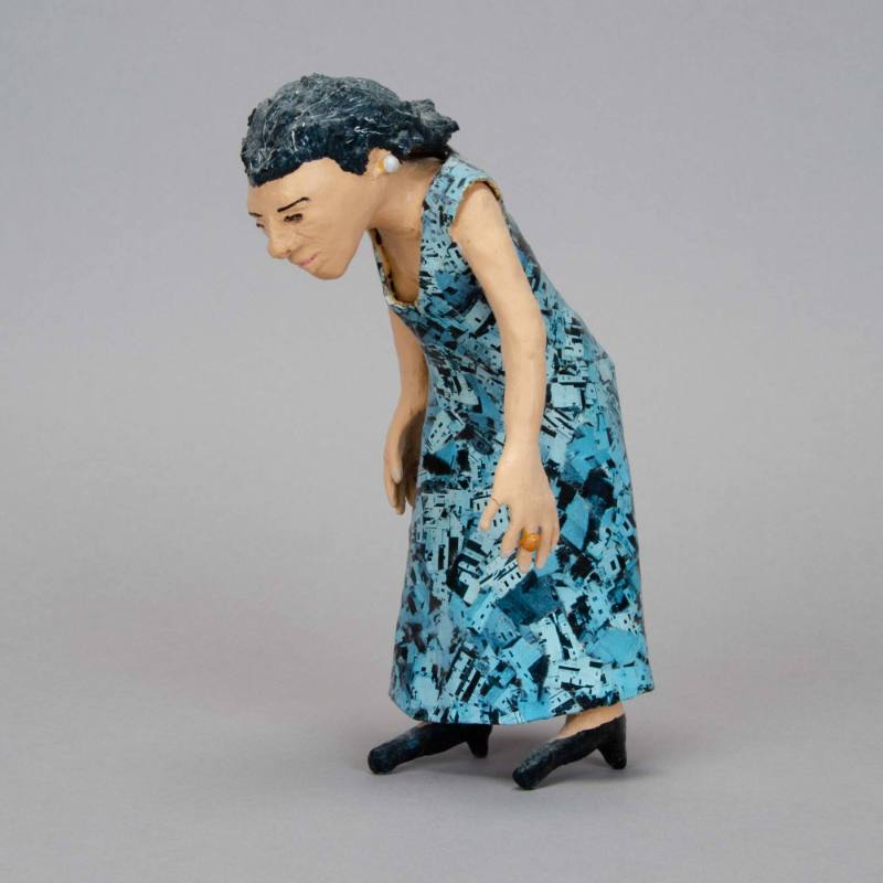 Dancing woman figurine