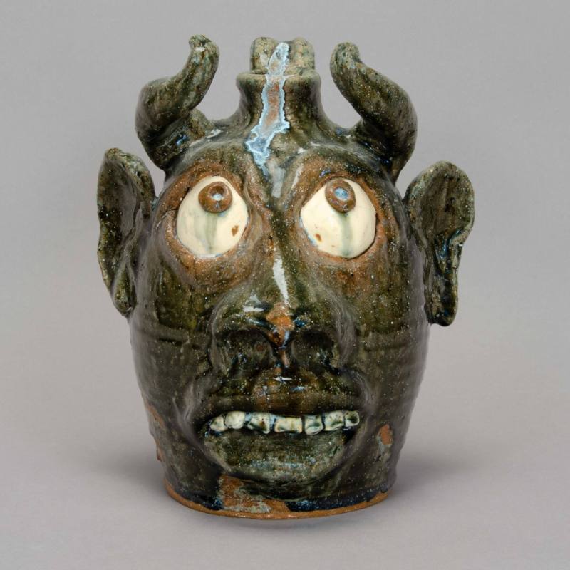 Devil face jug