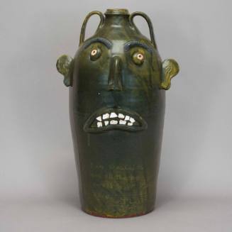 Double-faced face jug