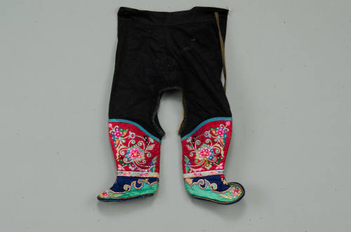 pants with shoes attached