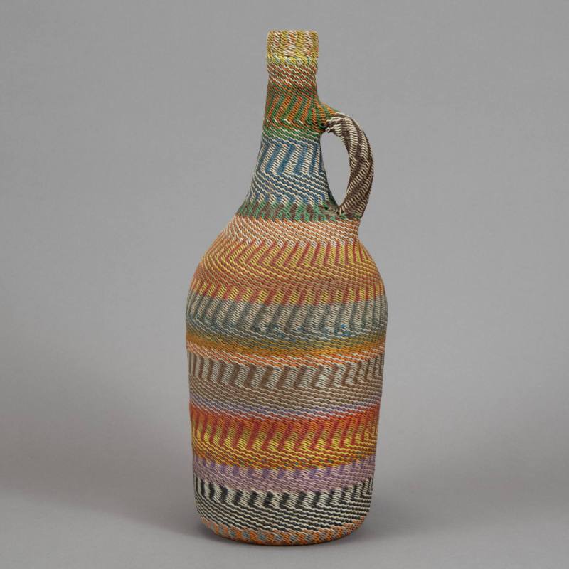 Wire-wrapped bottle with handle