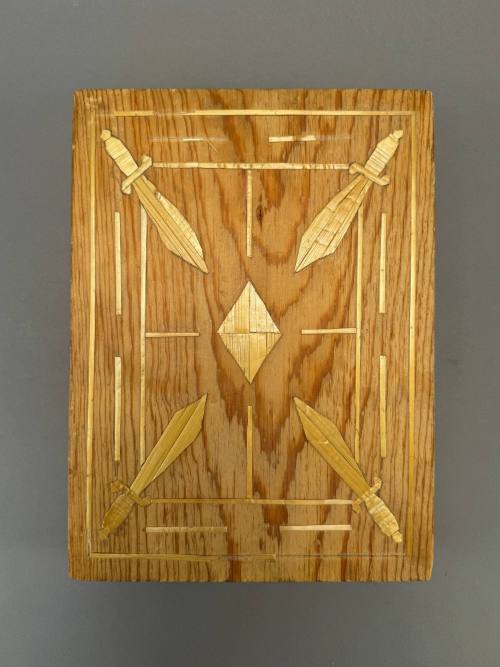Wood block with straw applique