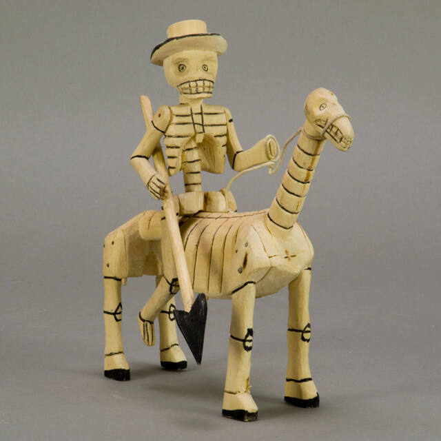 Sculpture, skeleton on horseback with lance