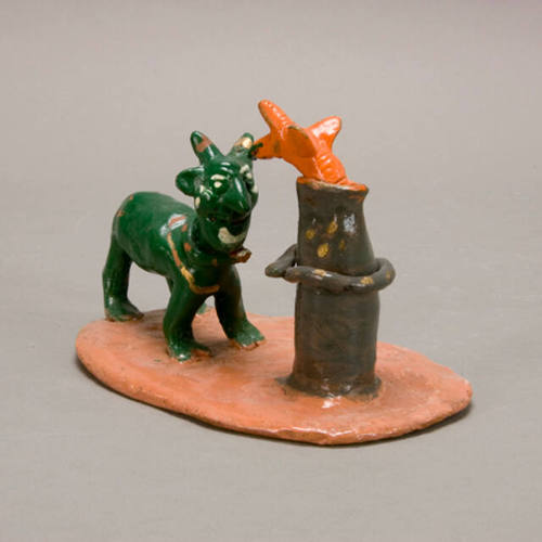 Devil and animal figure