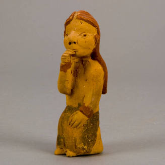 Figural whistle, woman with hand at mouth