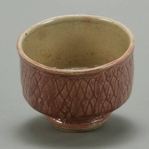 Stoneware High Foot Tea Bowl with strawberry glaze.