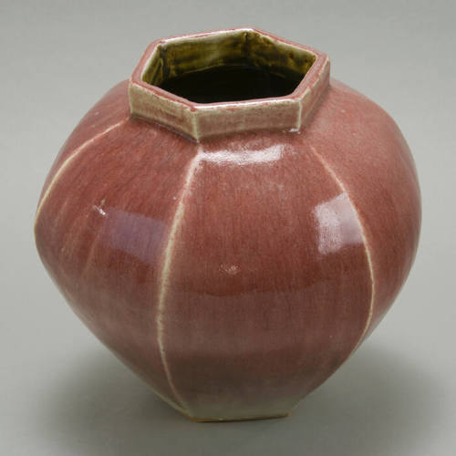 Red hexagonal jar with box