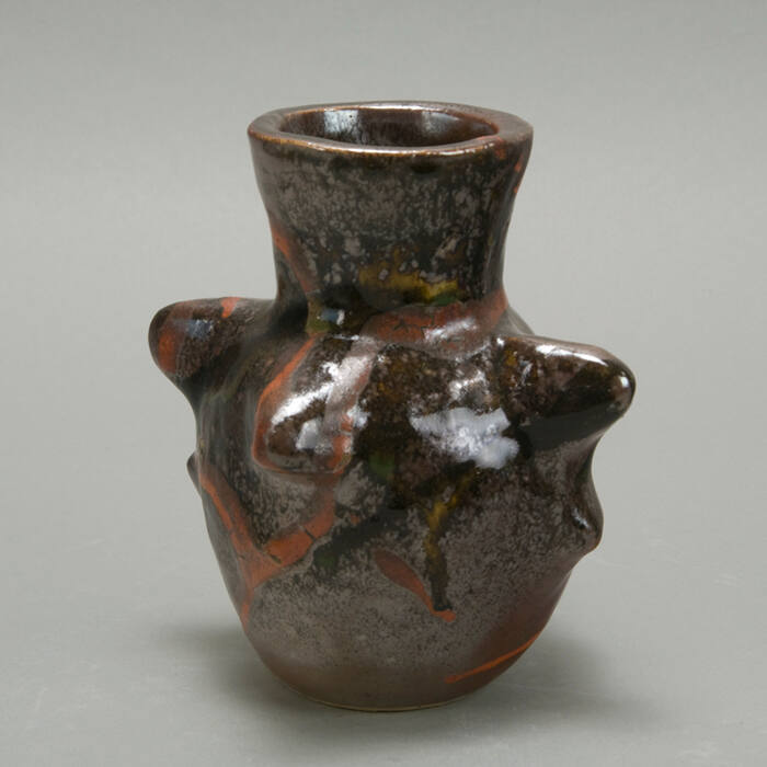 Stoneware irregular form brown glazed vase