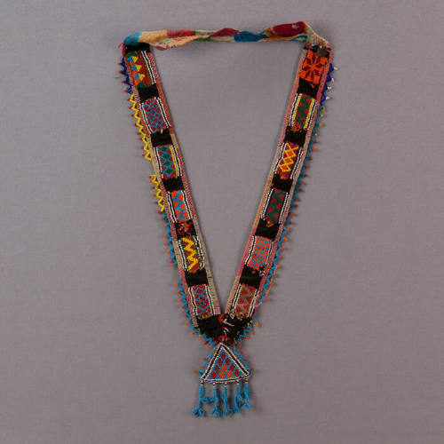 Necklace with triangular amulet