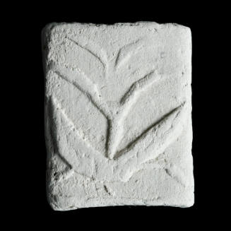 Sacred clay tablet with plant-like form