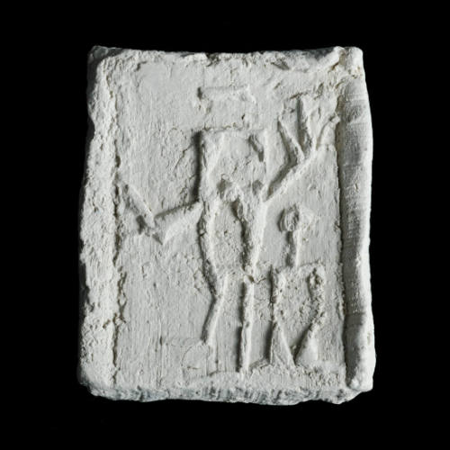 Sacred clay tablet with pair of stick figures