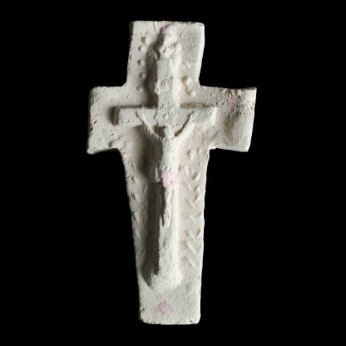 Sacred clay tablet in the shape of a cross