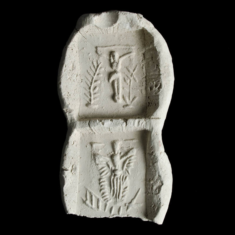 Sacred clay tablet holding two large tablets both showing a crucifix