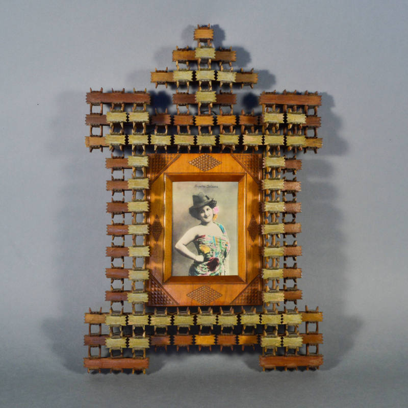 Tramp art puzzlework frame