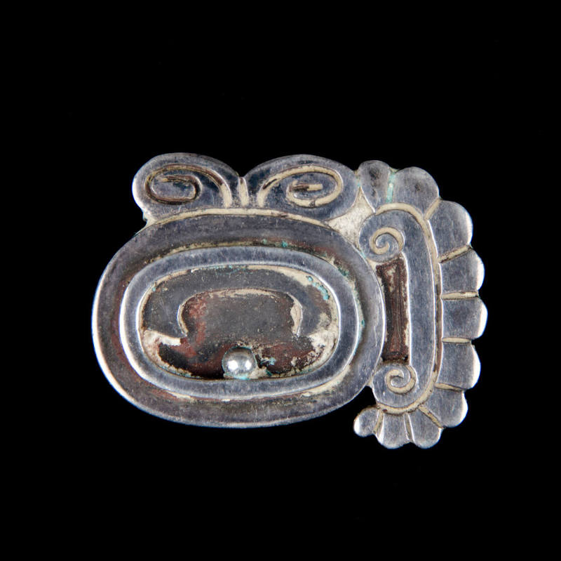 Mayan glyph brooch