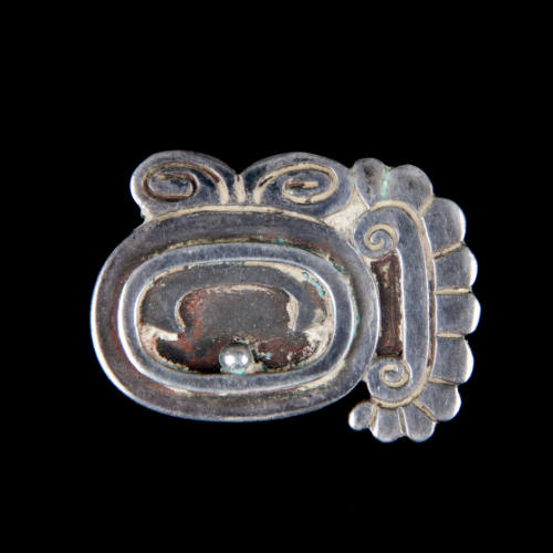 Mayan glyph brooch